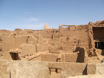 Old ruins of building against sky