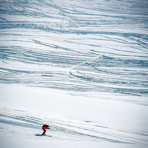 High angle view of person skiing on snowy land during winter