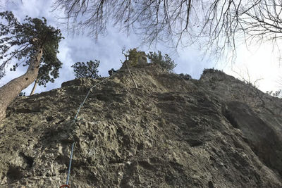 Low angle view of rocks against sky