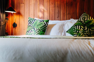 White sofa on bed at home