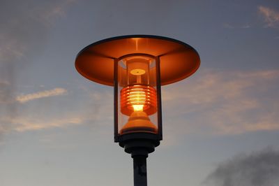 Low angle view of street light against sky