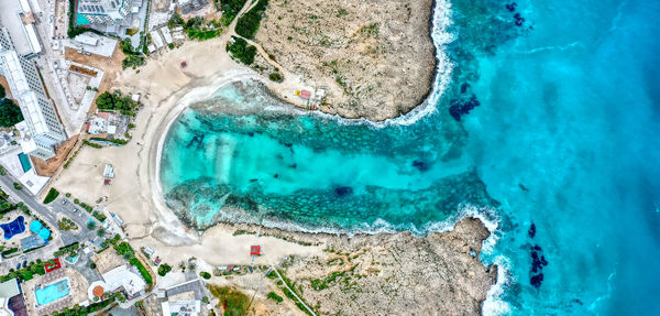 High angle view of rocky beach and bay