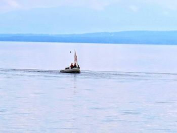 Boat sailing in sea