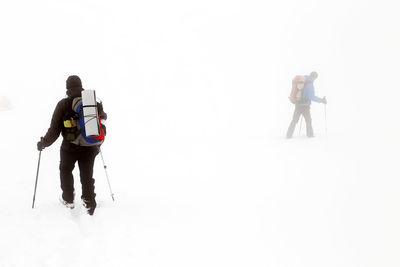 People hiking in snow