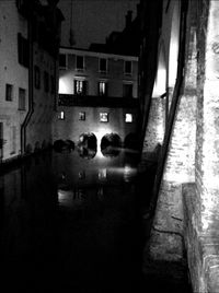 Reflection of illuminated buildings in water