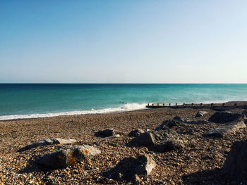 Scenic view of sea against clear sky