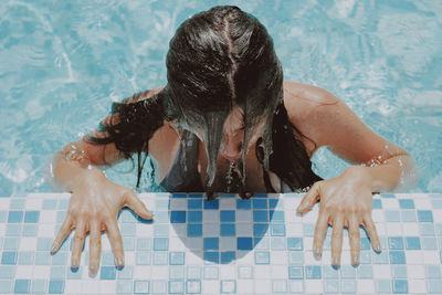 High angle view of woman in swimming pool