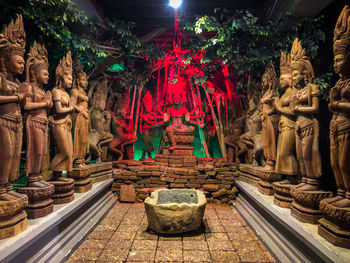 Statue of temple outside building