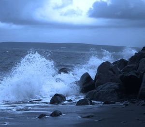 Waves splashing on rocks