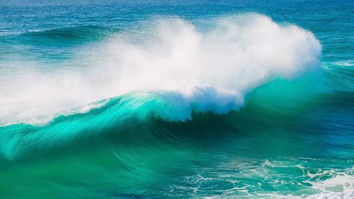 Sea waves splashing in swimming pool