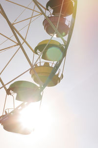 Low angle view of lighting equipment against sky