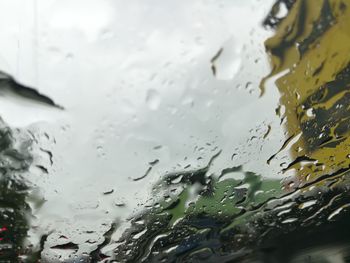 Full frame shot of wet glass window