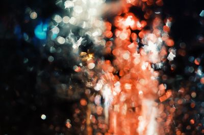 Defocused image of illuminated christmas lights