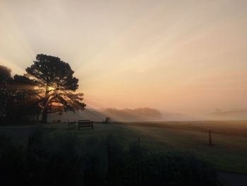 Scenic view of landscape at sunset