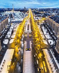 High angle view of vehicles on road in city