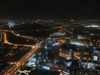 Illuminated cityscape at night