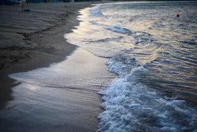 High angle view of surf on beach