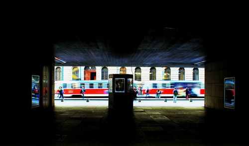 Cars in illuminated room at night
