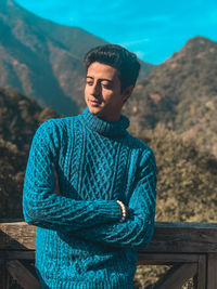 Young man looking away outdoors