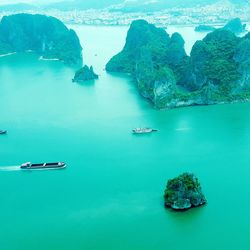 High angle view of boats sailing in sea