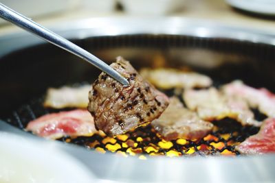 Close-up of food on barbecue grill