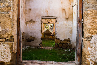 Old wooden door of abandoned building