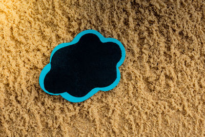 High angle view of heart shape on beach