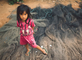 Full length portrait of cute girl