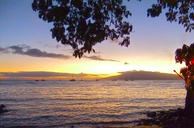 Scenic view of sea against sky during sunset