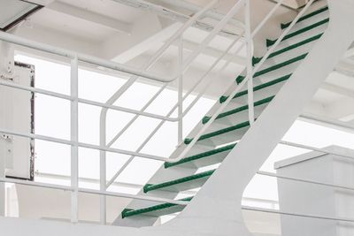 Low angle view of spiral staircase in building