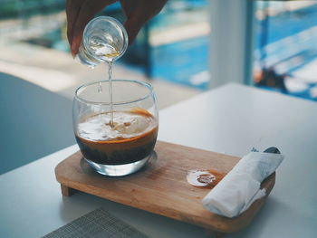 Close-up of coffee cup on table