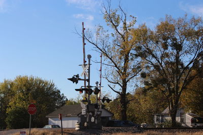 Low angle view of built structure against trees