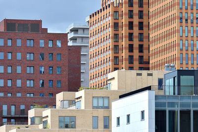 Low angle view of modern buildings in amsterdam-zuid district