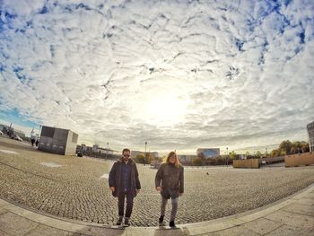 People on road against sky