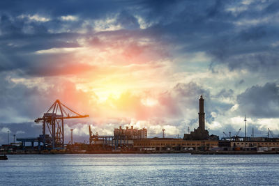 Commercial dock against cloudy sky