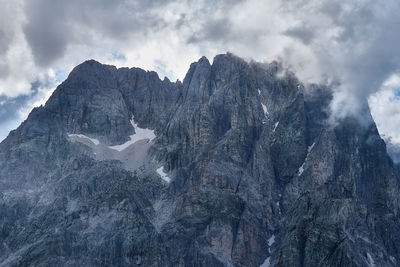 Rocky peak wrapped in the clouds of the great horn abruzzo