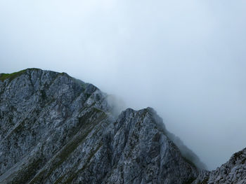 Scenic view of mountains against clear sky