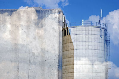 Low angle view of water tower against sky