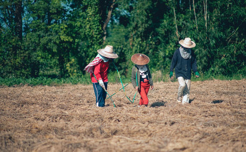 Full length of children playing on land