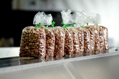 Close-up of bags of peanuts