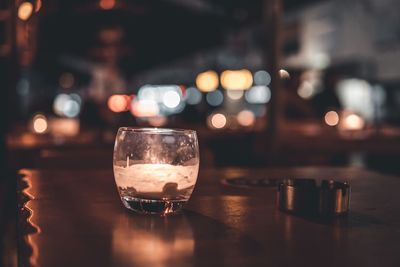 Close-up of wine in glass on table