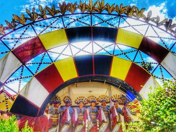 Low angle view of multi colored umbrella