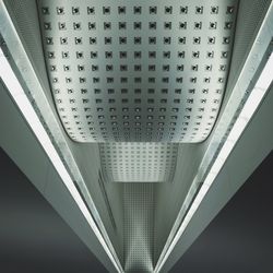 Low angle view of illuminated ceiling