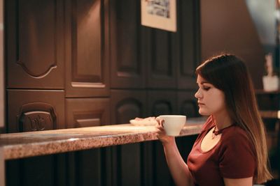 Woman drinking coffee cup