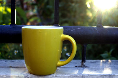 Close-up of coffee cup on table