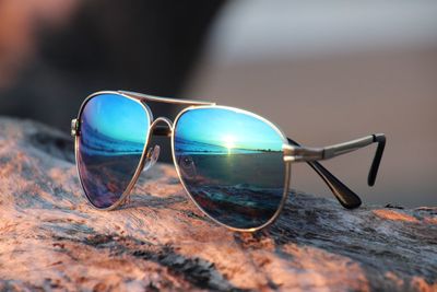 Close-up of sunglasses on table