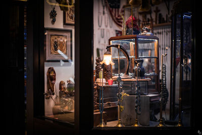 People standing in illuminated room