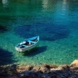 High angle view of boat moored on sea