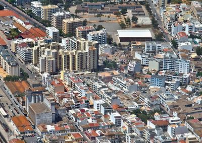 High angle view of residential buildings in city