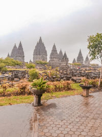 View of temple against building